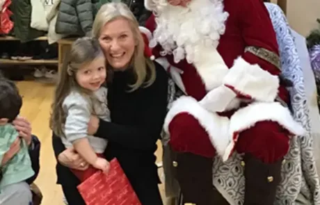 Mother and child with Father Christmas at Monkey Puzzle Highbury Nursery and Preschool
